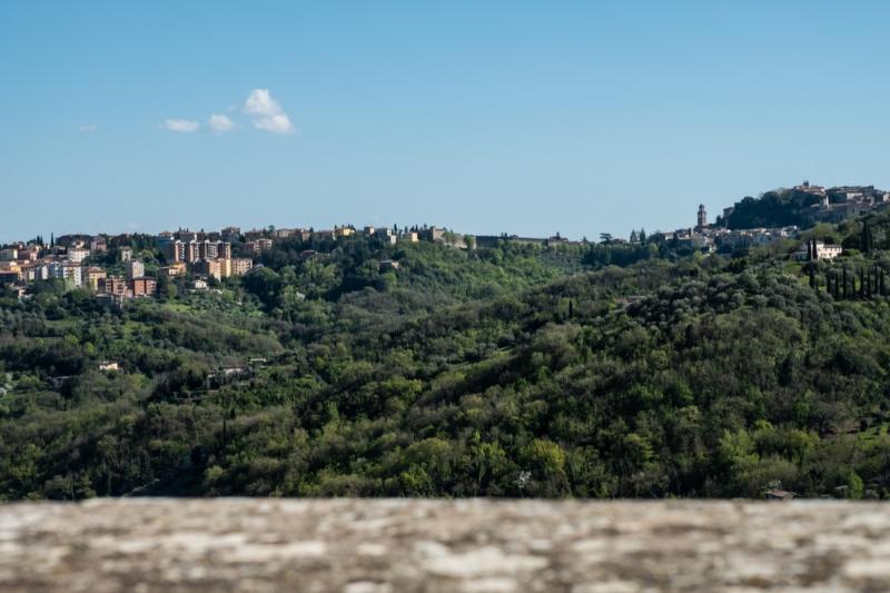 The private panoramic terrace of the Papavero (Poppy) Room at B&B C'era una volta, offering stunning views over Perugia and Assisi.